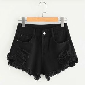 X-small black distressed jean shorts. Never worn